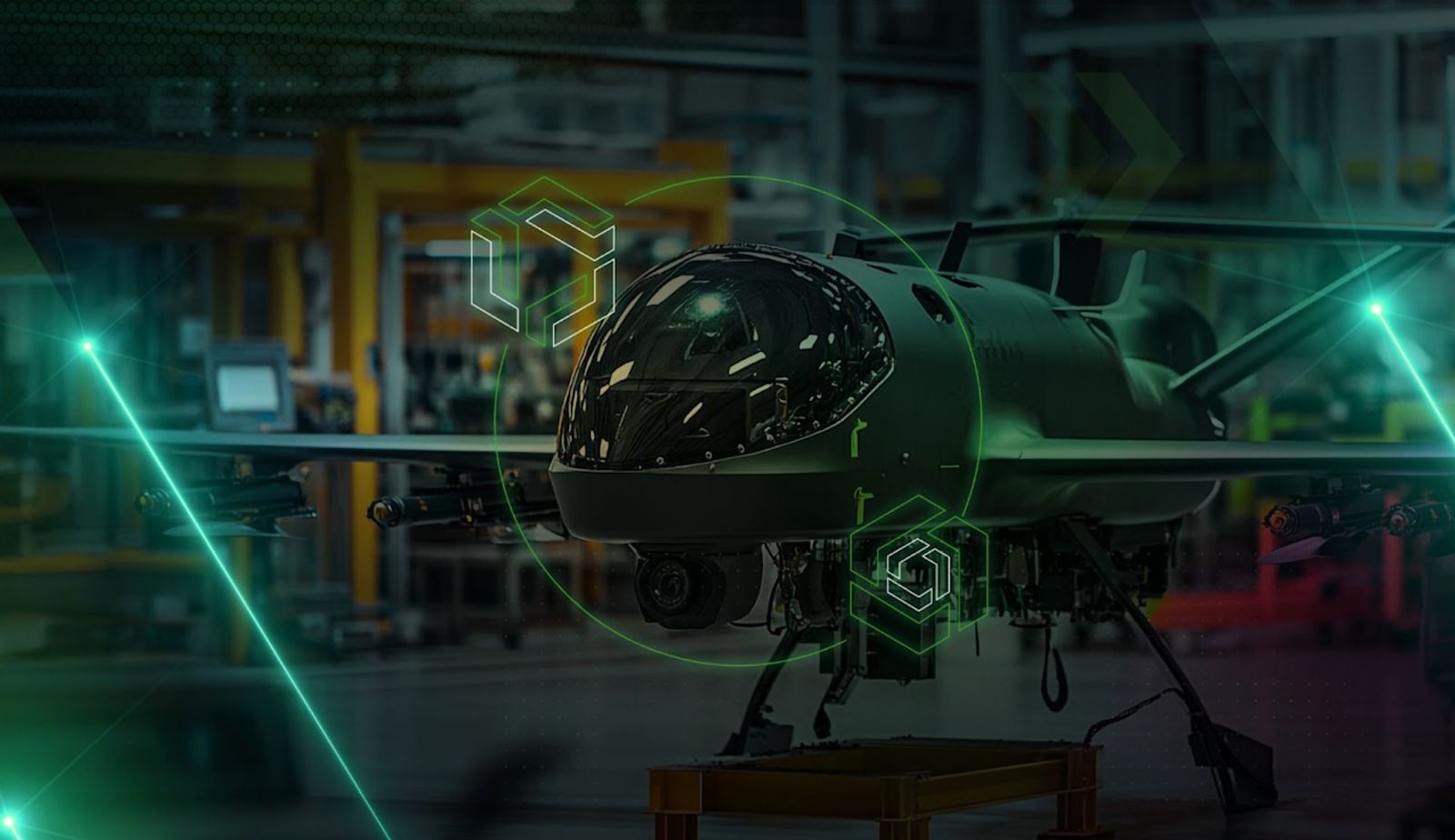 An unmanned aerial vehicle (UAV) in an industrial setting with the Onshape and Arena logos in the foreground. 